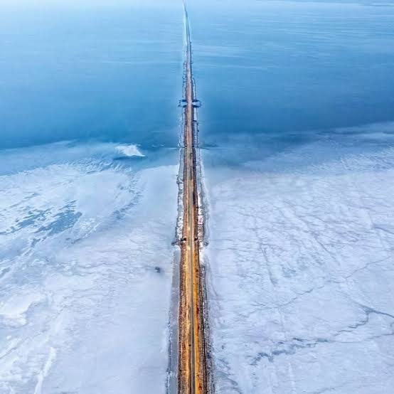 Road to Heaven, Kutch — road across the white salt landscape and blue water